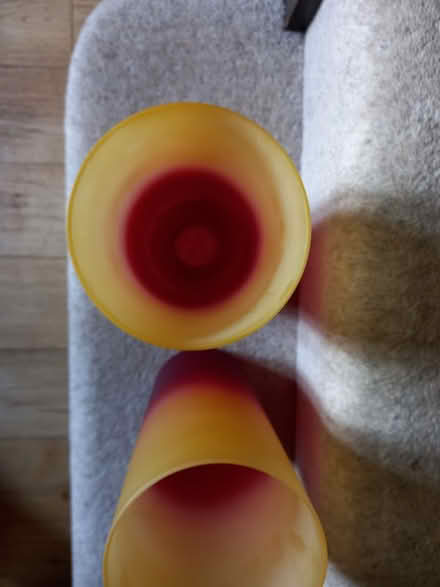 Photo of free Two red and yellow glass lamp shades (Taverham NR8)