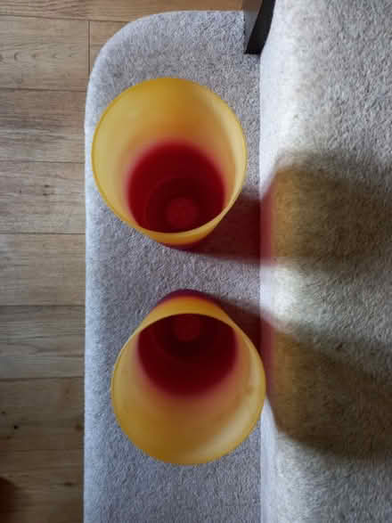 Photo of free Two red and yellow glass lamp shades (Taverham NR8)