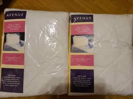 Photo of free X2 single quilted mattress covers (Tower Gardens Estate N17) #1