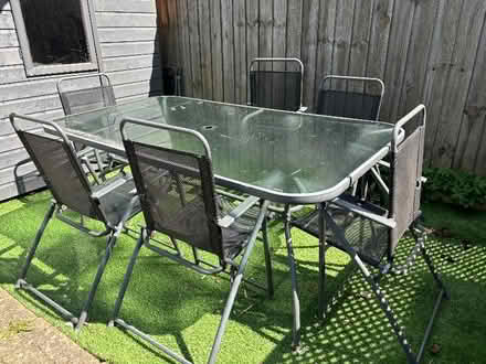 Photo of free Outside table with six chairs (Golden Triangle NR2) #1