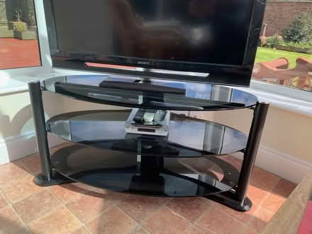Photo of free Smoke glass and chrome TV stand (Eston) #1
