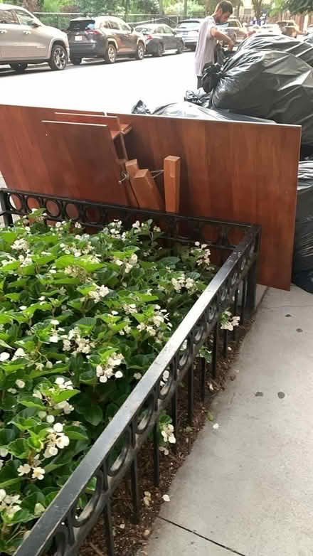 Photo of free Curb alert * Big MCM dining table (Near 55 E Ninth St Manhattan) #1