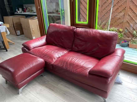 Photo of free Red leather couch and footstool (Clontarf) #1