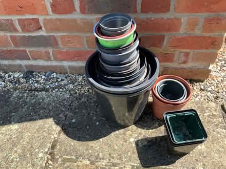 Photo of free 100’s plastic plant pots, etc (MK44) #1