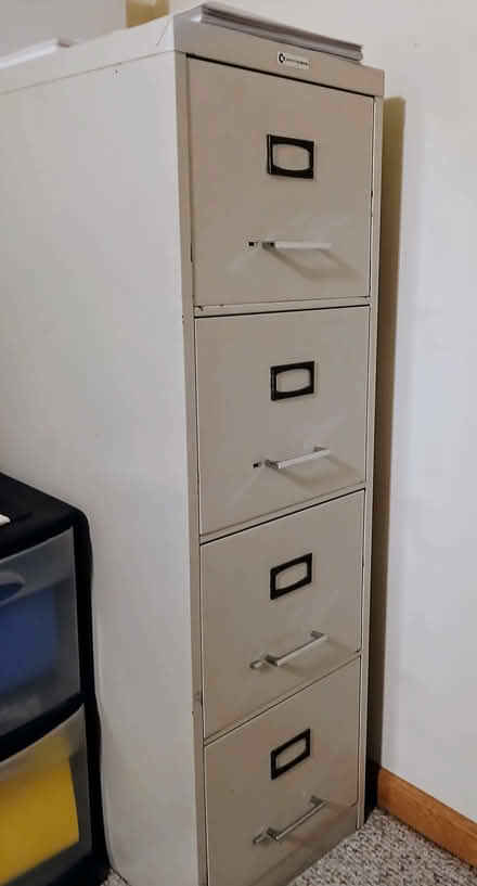 Photo of free 4 drawer filing cabinet (West Akron) #1