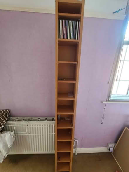 Photo of free Tall wood CD storage unit (Eltham SE9) #1