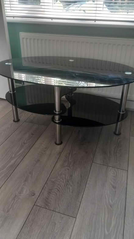 Photo of free Black and silver glass table (Dudley) #2