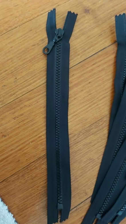 Photo of free 800 chunky black zips 23cm (Elwood) #1