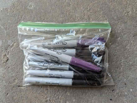 Photo of free Black and Purple Sharpies (Davis Square Somerville) #1
