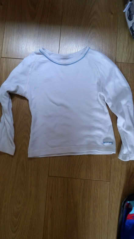 Photo of free Warm long sleeve top - size 4/5 years (Woking GU22) #1