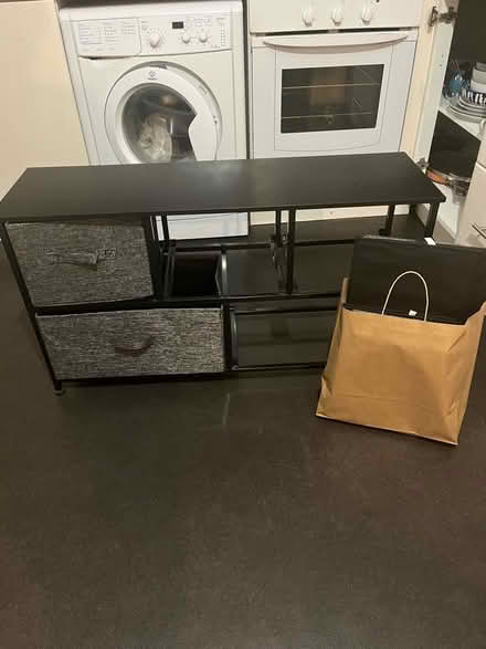 Photo of free Black metal TV stand (with boxes) (LS2, Woodhouse) #1