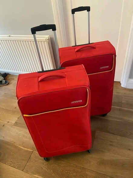 Photo of free Pair of large red suitcases (Little Chalfont HP6) #1