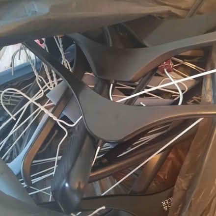 Photo of free Black bag full of wire and plastic coat hangers (Ruddington NG11) #1