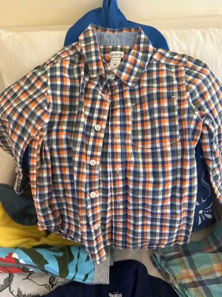 Photo of free Boys size 6 tops (Woodfield Rd &Airpark Rd) #1