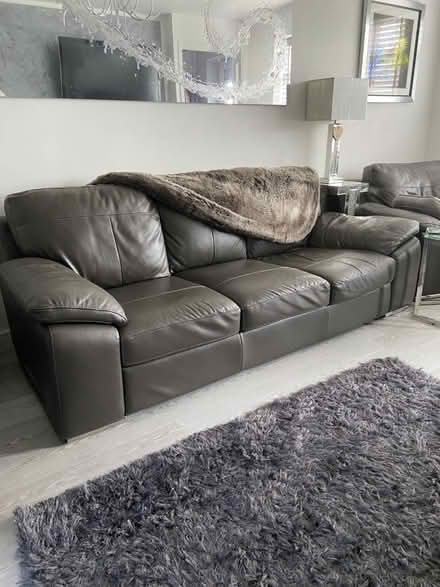 Photo of free 3 seater sofa and chair in grey leather (Rugeley WS15) #1