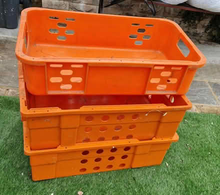 Photo of free Three orange plastic crates (Stoneleigh KT17) #1