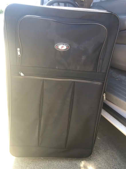 Photo of free LARGE 2 wheel suitcase (Hesperian Blvd) #3