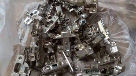 Photo of free Bag of pre used cupboard hinges (Innsworth GL3) #1