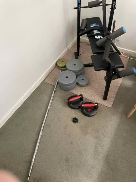 Photo of free Weights Bench with attachments and some weights. (Penn HP10) #1