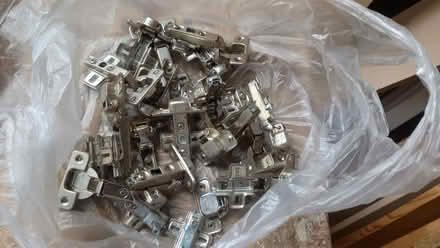 Photo of free Bag of pre used cupboard hinges (Innsworth GL3) #2