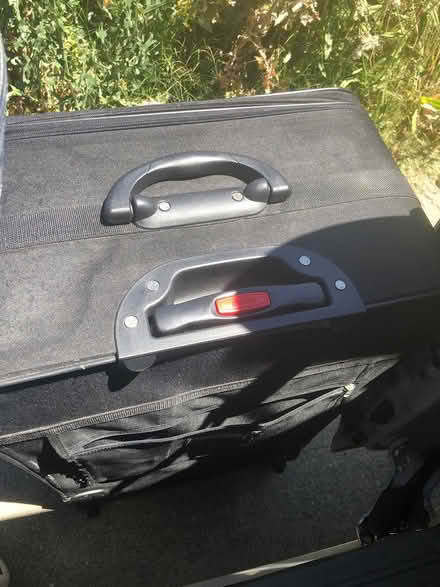 Photo of free LARGE 2 wheel suitcase (Hesperian Blvd) #1