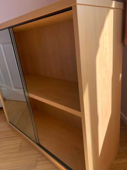 Photo of free Wood cabinet with glass sliders (Loders DT6) #2