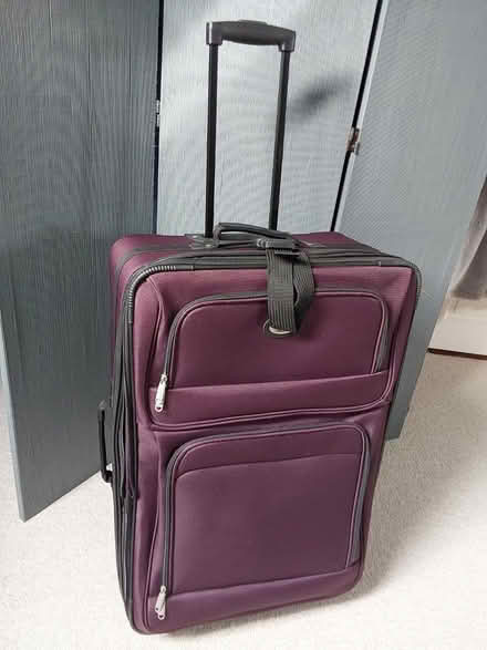 Photo of free Large purple suitcase (Hoole CH2) #1