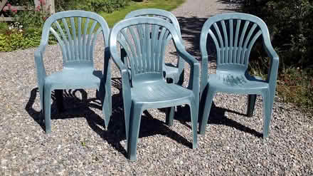 Photo of free 4 green plastic garden chairs (Bishop's Castle SY9) #2