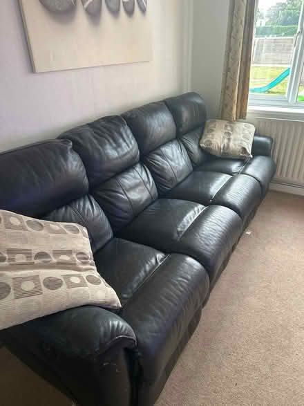 Photo of free 4 seater leather reclining sofa (GU22 Woking) #1