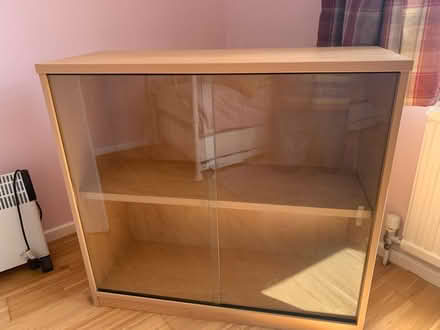Photo of free Wood cabinet with glass sliders (Loders DT6) #1