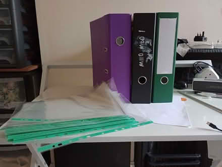 Photo of free Three lever arch files and A4 clear pockets (Braunstone LE3) #1