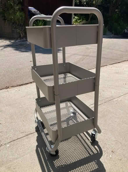 Photo of free small metal shelving unit on wheels (Silver Lake Blvd.) #2