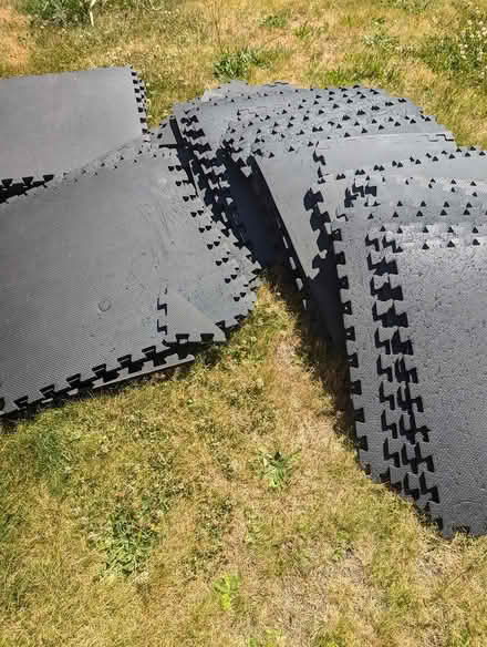 Photo of free 150sq ft black rubber floor mats (Just north of Panther Lake) #1