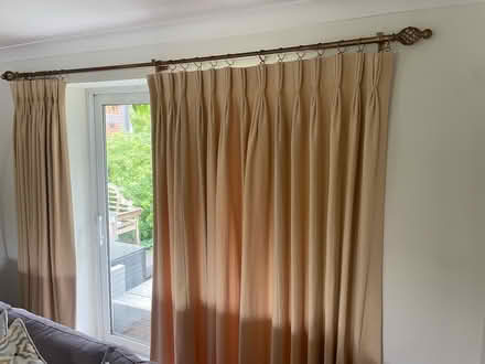 Photo of free Antique gold curtain poles 110in (GU5 Gomshall) #1