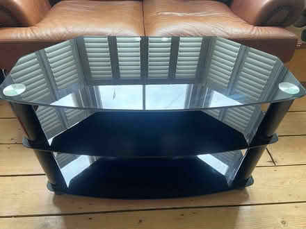 Photo of free TV stand with shelves (GL53) #1