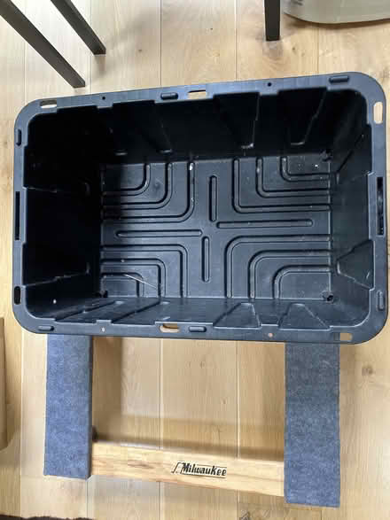 Photo of free Plastic work tub and Milwaukee rolling creeper (Clerkenwell WC1X) #1