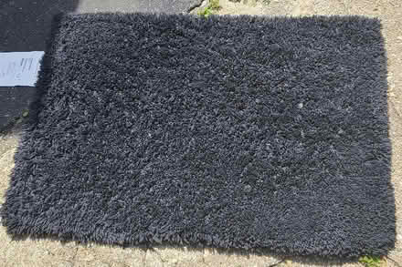 Photo of free Small black rug 2'x3' (Whitinsville, MA) #1