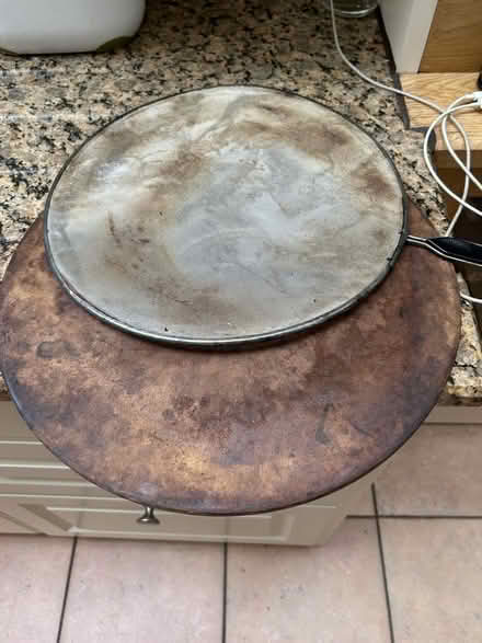Photo of free Pizza stone, pan splatter thing (Chiswick W4) #1