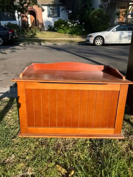 Photo of free Curb Alert: wood toy chest (Wilshire and La Cienega) #1