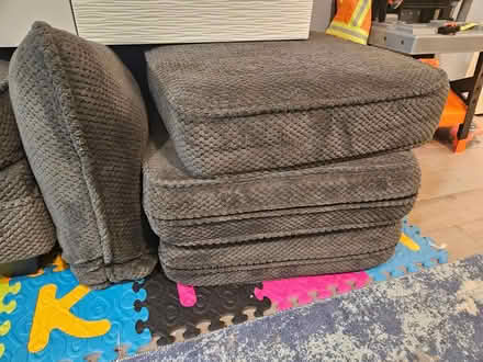 Photo of free Grey Couch Cushions (Convention Center) #1