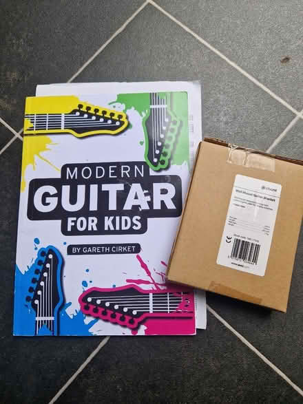 Photo of free Kids guitar book & wall bracket (Middleton MK10) #1