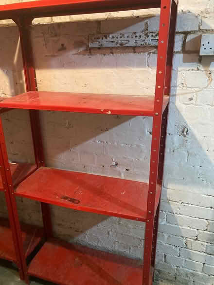 Photo of free 2-3 red metal shelving units (W4) #1