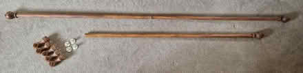 Photo of free 2 wood curtain poles (Ashford, TN23) #1