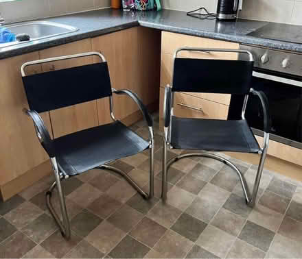 Photo of free 2 black leather chairs (PO19, Chichester) #1