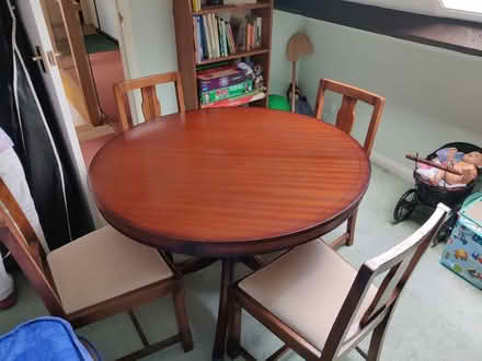 Photo of free Circular wooden table with four matching chairs (Ferring BN12) #1