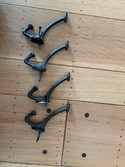 Photo of free 4 wrought iron double wall hooks (San Leandro) #1