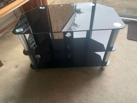 Photo of free Black glass TV stand (CH63) #1
