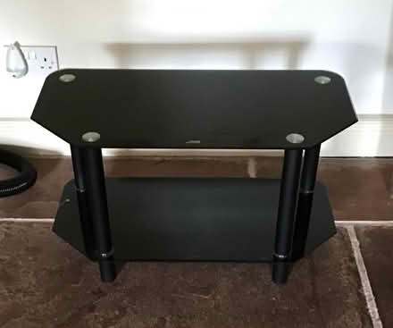 Photo of free Black Two Tiered TV Stand (Great Strickland CA10) #1