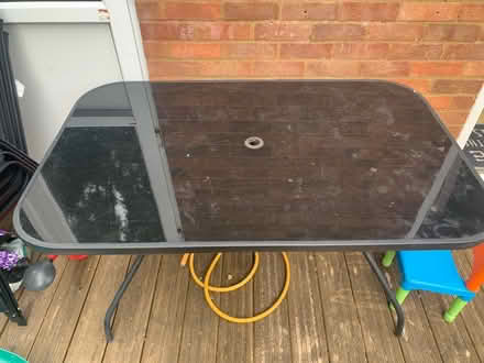 Photo of free Glass topped garden table (Royston) #1