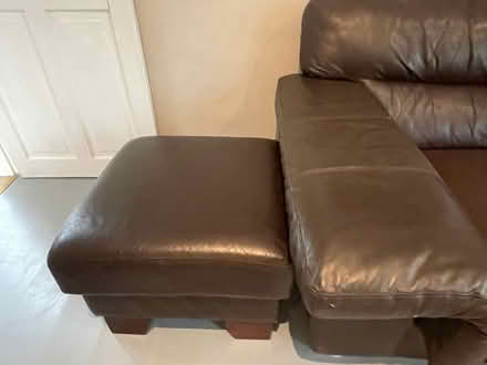Photo of free 3 seater brown leather sofa plus footstool (Wigston LE18) #3
